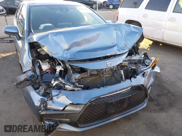 2022 Toyota Corolla SE with VIN JTDS4MCE9NJ082078, listed as a IAAI auction lot 41291406 with 57,202 mi miles and . Bid and sale history available at DreamBid. Image 6.