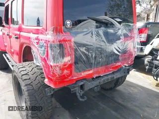 2019 Jeep Wrangler Unlimited Sahara with VIN 1C4HJXEN0KW552028, listed as a IAAI auction lot 41934634 with 53,054 mi miles and . Bid and sale history available at DreamBid. Image 6.