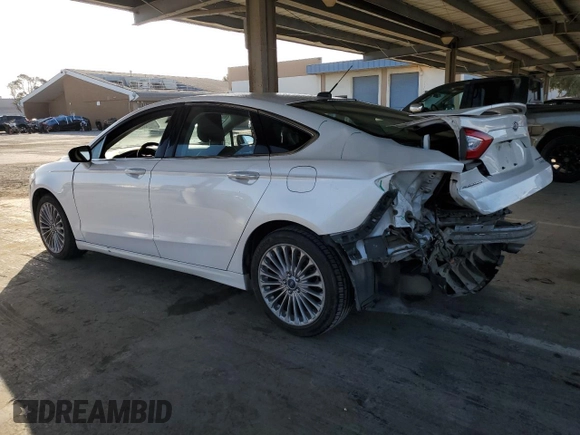 2013 Ford Fusion Titanium Hybrid with VIN 3FA6P0RU9DR371620, listed as a Copart auction lot 53141575 with 176,972 mi miles and Salvage Title. Bid and sale history available at carsss.com. Image 2.