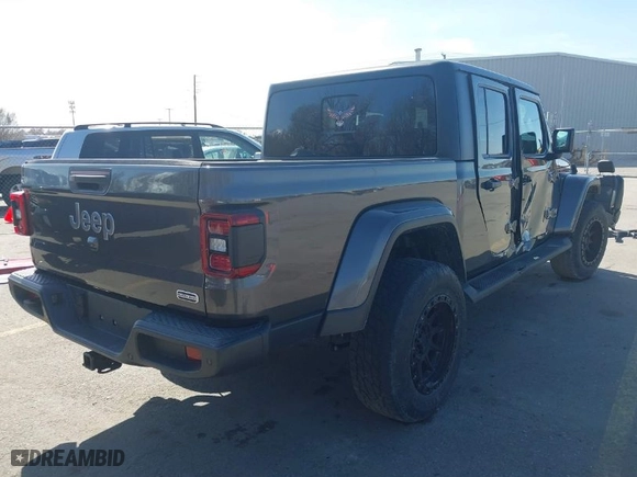 2021 Jeep Gladiator Overland with VIN 1C6HJTFG3ML588042, listed as a IAAI auction lot 41730427 with 22,344 mi miles. Bid and sale history available at carsss.com. Image 4.