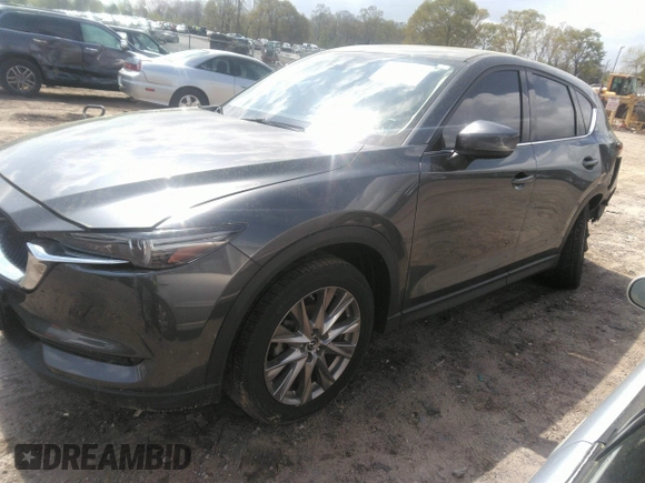 2019 Mazda CX-5 Grand Touring with VIN JM3KFBDM7K0606860, listed as a IAAI auction lot 41936338 with 93,057 mi miles. Bid and sale history available at carsss.com. Image 17.