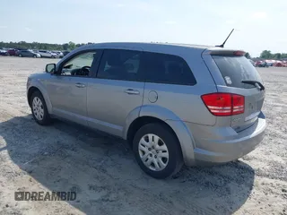 2015 Dodge Journey SE z VIN 3C4PDCAB0FT698674, wystawiony jako IAAI lot #42308994 z przebiegiem 97 640 mil mil oraz . Historia ofert i sprzedaży dostępna na DreamBid. Obrazek 3.