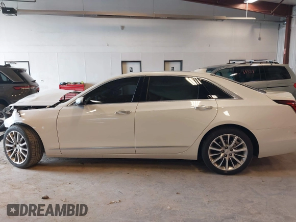 2017 Cadillac CT6 Luxury AWD z VIN 1G6KD5RS9HU203376, wystawiony jako IAAI lot #42181002 z przebiegiem Nie podano mil oraz . Historia ofert i sprzedaży dostępna na DreamBid. Obrazek 14.