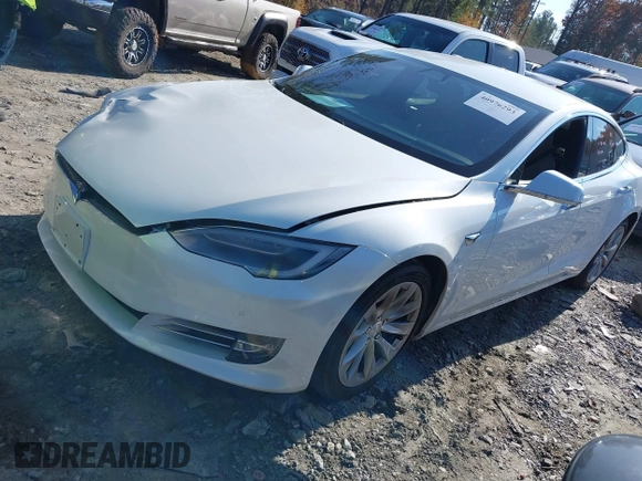 2016 Tesla Model S 70 with VIN 5YJSA1E16GF164264, listed as a IAAI auction lot 40976293 with 68,940 mi miles and . Bid and sale history available at DreamBid. Image 2.