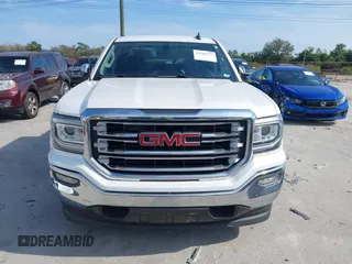 2017 GMC Sierra 1500 SLT with VIN 3GTP1NECXHG423591, listed as a IAAI auction lot 41509177 with 100,071 mi miles and . Bid and sale history available at DreamBid. Image 12.