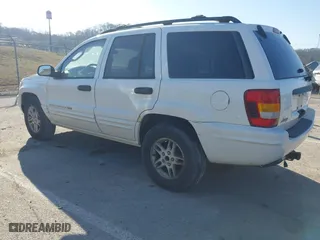 2004 Jeep Grand Cherokee Laredo with VIN 1J4GX48S84C206933, listed as a IAAI auction lot 41739364 with 257,893 mi miles. Bid and sale history available at carsss.com. Image 3.