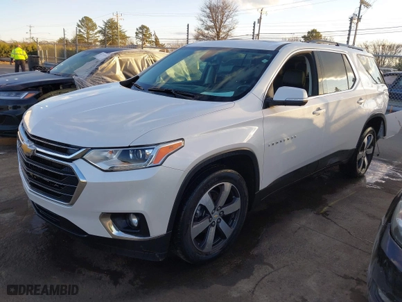 2021 Chevrolet Traverse LT Leather with VIN 1GNERHKW5MJ174570, listed as a IAAI auction lot 41250400 with 80,689 mi miles. Bid and sale history available at carsss.com. Image 2.