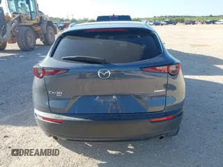 2025 Mazda CX-30 S Carbon Edition z VIN 3MVDMBCMXSM790941, wystawiony jako IAAI lot #42514372 z przebiegiem 17 235 mil mil oraz . Historia ofert i sprzedaży dostępna na DreamBid. Obrazek 16.