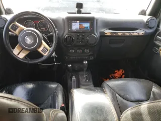 2014 Jeep Wrangler Unlimited Sahara with VIN 1C4BJWEG6EL185501, listed as a Copart auction lot 51538065 with 102,866 mi miles and Salvage Title. Bid and sale history available at carsss.com. Image 8.