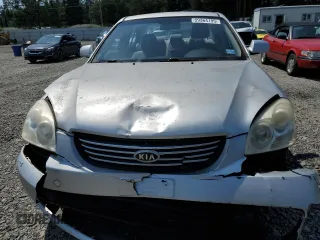 2008 Kia Optima LX z VIN KNAGE123185190108, wystawiony jako Copart lot #59364195 z przebiegiem 131 344 mil mil oraz Szkoda całkowita • Salvage title. Historia ofert i sprzedaży dostępna na DreamBid. Obrazek 5.