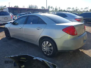 2009 Pontiac G6 w/1SA *Ltd Avail* with VIN 1G2ZG57B594156522, listed as a IAAI auction lot 40931964 with 197,196 mi miles. Bid and sale history available at carsss.com. Image 3.