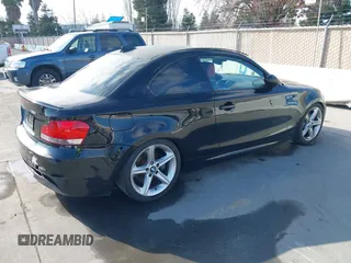 2008 BMW 1 Series 135i with VIN WBAUC73548VF25411, listed as a IAAI auction lot 41479409 with 153,643 mi miles. Bid and sale history available at carsss.com. Image 4.