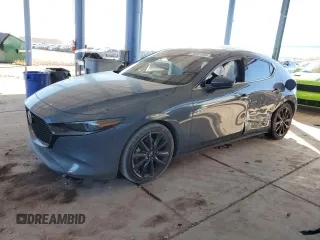 2019 Mazda Mazda3 Hatchback w/Premium Pkg with VIN JM1BPBNM9K1125071, listed as a Copart auction lot 86589954 with 63,157 mi miles and Salvage Title. Bid and sale history available at carsss.com. Image 1.