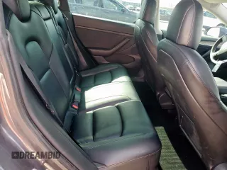 2021 Tesla Model 3 Standard Range Plus z VIN 5YJ3E1EA6MF082796, wystawiony jako Copart lot #53110955 z przebiegiem 92 009 mil mil oraz Szkoda całkowita • Salvage title. Historia ofert i sprzedaży dostępna na DreamBid. Obrazek 10.