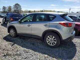 2015 Mazda CX-5 Sport z VIN JM3KE2BE3F0474927, wystawiony jako Copart lot #55444685 z przebiegiem 168 264 mil mil oraz Czysty tytuł • Clean title. Historia ofert i sprzedaży dostępna na DreamBid. Obrazek 2.
