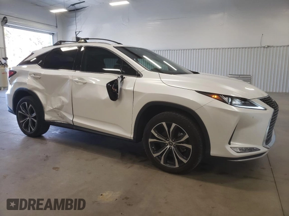 2022 Lexus RX with VIN 2T2HZMAA2NC220854, listed as a Copart auction lot 38512353 with 23,777 mi miles. Bid and sale history available at carsss.com. Image 4.