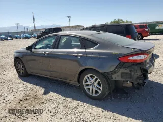 2016 Ford Fusion SE with VIN 3FA6P0H7XGR386496, listed as a Copart auction lot 61578165 with 101,467 mi miles and Salvage title. Bid and sale history available at DreamBid. Image 2.