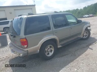 2001 Ford Explorer Eddie Bauer z VIN 1FMDU84PX1ZA24486, wystawiony jako IAAI lot #42533270 z przebiegiem 152 550 mil mil oraz . Historia ofert i sprzedaży dostępna na DreamBid. Obrazek 4.