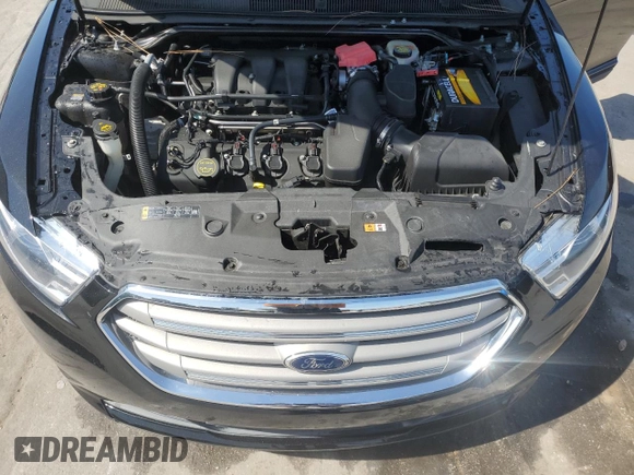 2015 Ford Taurus SEL with VIN 1FAHP2E87FG208522, listed as a Copart auction lot 46700095 with 97,439 mi miles and Salvage title. Bid and sale history available at DreamBid. Image 11.