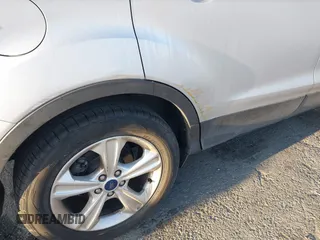 2016 Ford Escape SE z VIN 1FMCU0GX4GUB25618, wystawiony jako IAAI lot #42014559 z przebiegiem 139 350 mil mil oraz . Historia ofert i sprzedaży dostępna na DreamBid. Obrazek 6.