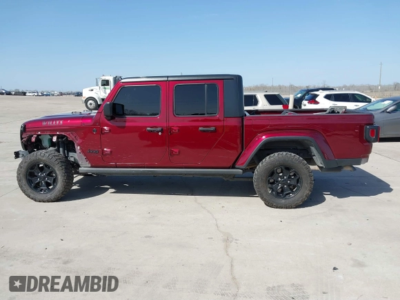 2021 Jeep Gladiator Willys z VIN 1C6HJTAG0ML536455, wystawiony jako IAAI lot #41702393 z przebiegiem 90 644 mil mil oraz . Historia ofert i sprzedaży dostępna na DreamBid. Obrazek 14.