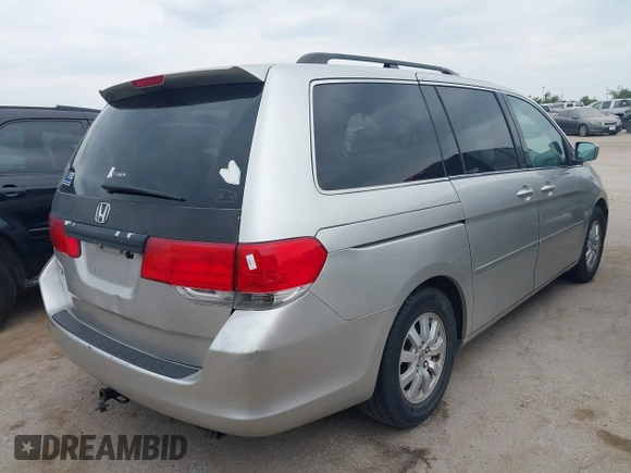 2008 Honda Odyssey EX-L with VIN 5FNRL38648B094938, listed as a IAAI auction lot 42045683 with 216,405 mi miles. Bid and sale history available at carsss.com. Image 4.