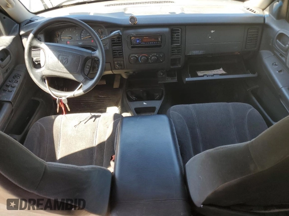 2001 Dodge Dakota Sport z VIN 1B7GG2AN81S113605, wystawiony jako Copart lot #58990065 z przebiegiem 243 919 mil mil oraz Czysty tytuł • Clean title. Historia ofert i sprzedaży dostępna na DreamBid. Obrazek 8.