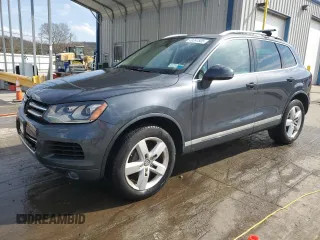 2011 Volkswagen Touareg Sport with VIN WVGFF9BPXBD005821, listed as a Copart auction lot 49391505 with 111,938 mi miles and Salvage Title. Bid and sale history available at DreamBid. Image 1.