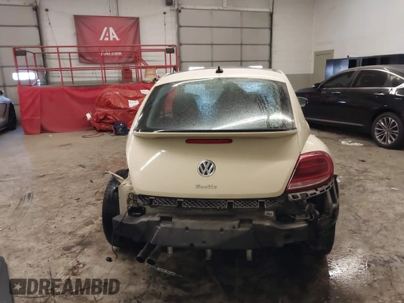 2019 Volkswagen Beetle S with VIN 3VWFD7ATXKM705322, listed as a IAAI auction lot 41409600 with 97,479 mi miles. Bid and sale history available at carsss.com. Image 17.