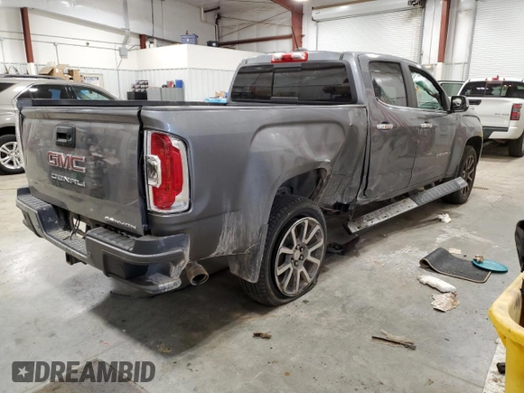 2021 GMC Canyon 4WD Denali with VIN 1GTG6EEN3M1129459, listed as a Copart auction lot 87618305 with 37,663 mi miles and Salvage Title. Bid and sale history available at carsss.com. Image 3.