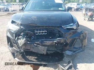 2021 Audi Q3 S line Premium Plus z VIN WA1EECF38M1111853, wystawiony jako IAAI lot #42367677 z przebiegiem 53 681 mil mil oraz . Historia ofert i sprzedaży dostępna na DreamBid. Obrazek 6.