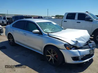 2015 Volkswagen Passat 1.8T Limited Edition with VIN 1VWAT7A30FC014689, listed as a IAAI auction lot 41758748 with 140,545 mi miles. Bid and sale history available at carsss.com. Image 1.