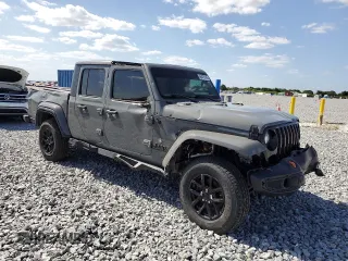 2022 Jeep Gladiator Texas Trail with VIN 1C6HJTAG9NL146049, listed as a Copart auction lot 55475145 with 51,590 mi miles and Salvage Title. Bid and sale history available at carsss.com. Image 4.