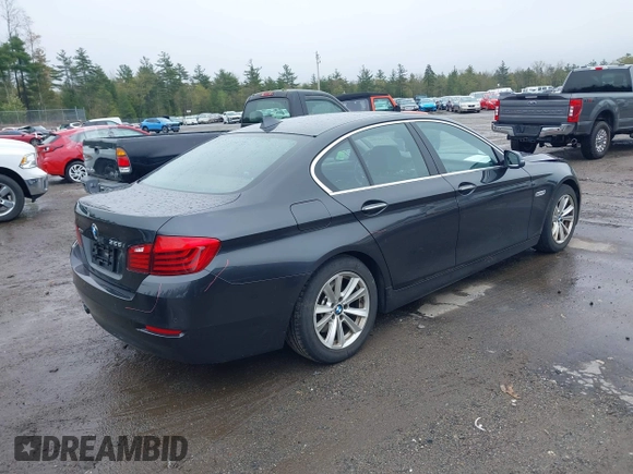 2015 BMW 5 Series 528i xDrive with VIN WBA5A7C59FG142685, listed as a IAAI auction lot 42181388 with 124,482 mi miles and . Bid and sale history available at DreamBid. Image 4.