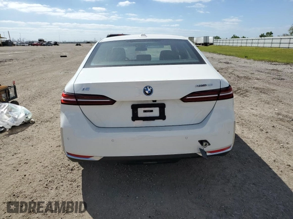 2024 BMW i5 eDrive40 with VIN WBY33FK05RCR50188, listed as a Copart auction lot 52953195 with 423 mi miles and Salvage title. Bid and sale history available at DreamBid. Image 6.