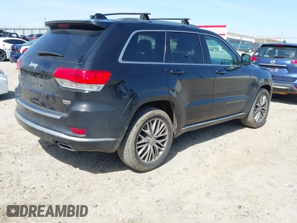 2018 Jeep Grand Cherokee Summit with VIN 1C4RJEJG2JC392847, listed as a IAAI auction lot 41751452 with 136,793 mi miles and . Bid and sale history available at DreamBid. Image 4.