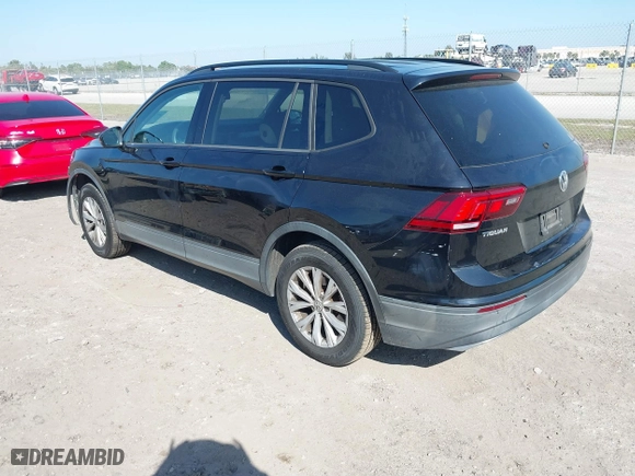 2018 Volkswagen Tiguan S with VIN 3VV1B7AX6JM036407, listed as a IAAI auction lot 41705021 with 84,171 mi miles. Bid and sale history available at carsss.com. Image 3.