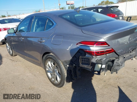 2022 Genesis G70 2.0T with VIN KMTG34TA9NU093023, listed as a IAAI auction lot 40989282 with 50,036 mi miles. Bid and sale history available at carsss.com. Image 3.
