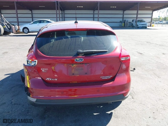 2015 Ford Focus Titanium with VIN 1FADP3N28FL215499, listed as a IAAI auction lot 41839092 with 152,102 mi miles. Bid and sale history available at carsss.com. Image 15.