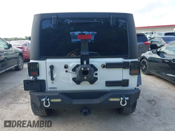 2016 Jeep Wrangler Unlimited Sport RHD z VIN 1C4BJWKG3GL293694, wystawiony jako IAAI lot #42569773 z przebiegiem 140 243 mil mil oraz . Historia ofert i sprzedaży dostępna na DreamBid. Obrazek 16.