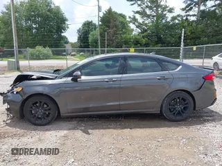 2020 Ford Fusion SE z VIN 3FA6P0HD6LR160147, wystawiony jako IAAI lot #42499983 z przebiegiem 73 971 mil mil oraz . Historia ofert i sprzedaży dostępna na DreamBid. Obrazek 15.