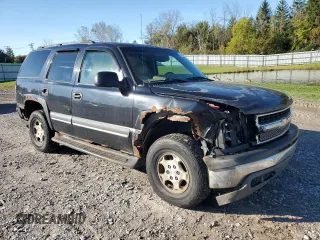 2004 Chevrolet Tahoe LS with VIN 1GNEK13T44J174219, listed as a Copart auction lot 74124674 with 235,172 mi miles and Salvage Title. Bid and sale history available at carsss.com. Image 4.
