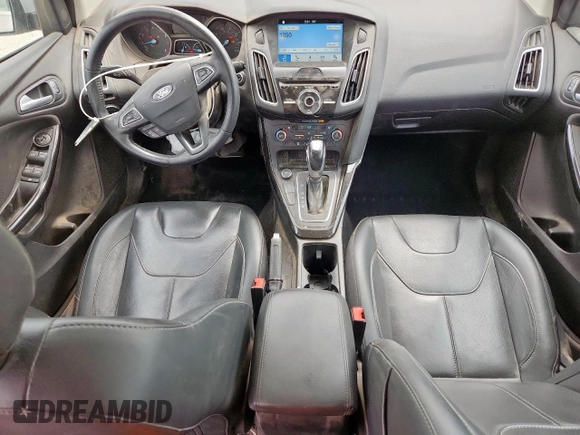 2017 Ford Focus Titanium with VIN 1FADP3N28HL346418, listed as a Copart auction lot 63507125 with 107,761 mi miles and Salvage title. Bid and sale history available at DreamBid. Image 8.