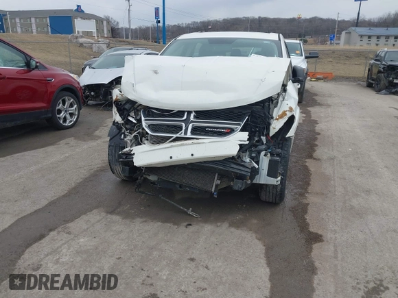 2014 Dodge Journey SE with VIN 3C4PDCAB7ET134454, listed as a IAAI auction lot 41966206 with 145,814 mi miles and . Bid and sale history available at DreamBid. Image 6.