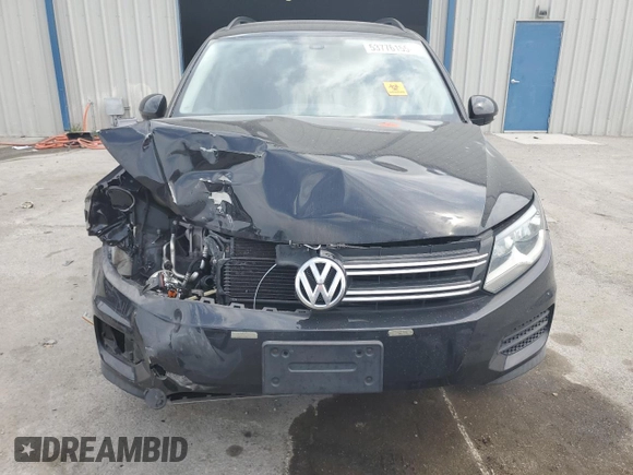 2017 Volkswagen Tiguan S with VIN WVGAV7AX8HK038419, listed as a Copart auction lot 53776155 with 72,006 mi miles and Salvage Title. Bid and sale history available at DreamBid. Image 5.