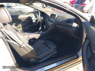 2013 BMW 6 Series 640i with VIN WBALW7C52DDX58705, listed as a IAAI auction lot 41848280 with 91,243 mi miles. Bid and sale history available at carsss.com. Image 5.