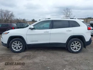 2017 Jeep Cherokee Latitude with VIN 1C4PJMCB3HW530794, listed as a IAAI auction lot 41854670 with 103,798 mi miles. Bid and sale history available at carsss.com. Image 14.