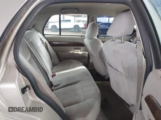 2006 Mercury Grand Marquis GS z VIN 2MEFM74VX6X638763, wystawiony jako IAAI lot #41735612 z przebiegiem 123 914 mil mil oraz . Historia ofert i sprzedaży dostępna na DreamBid. Obrazek 8.