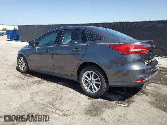 2016 Ford Focus SE with VIN 1FADP3F20GL250053, listed as a Copart auction lot 57134955 with 120,261 mi miles and Salvage title. Bid and sale history available at DreamBid. Image 2.