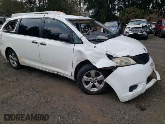 2014 Toyota Sienna L with VIN 5TDZK3DC8ES520037, listed as a Copart auction lot 54092715 with Not provided miles and Salvage title. Bid and sale history available at DreamBid. Image 4.